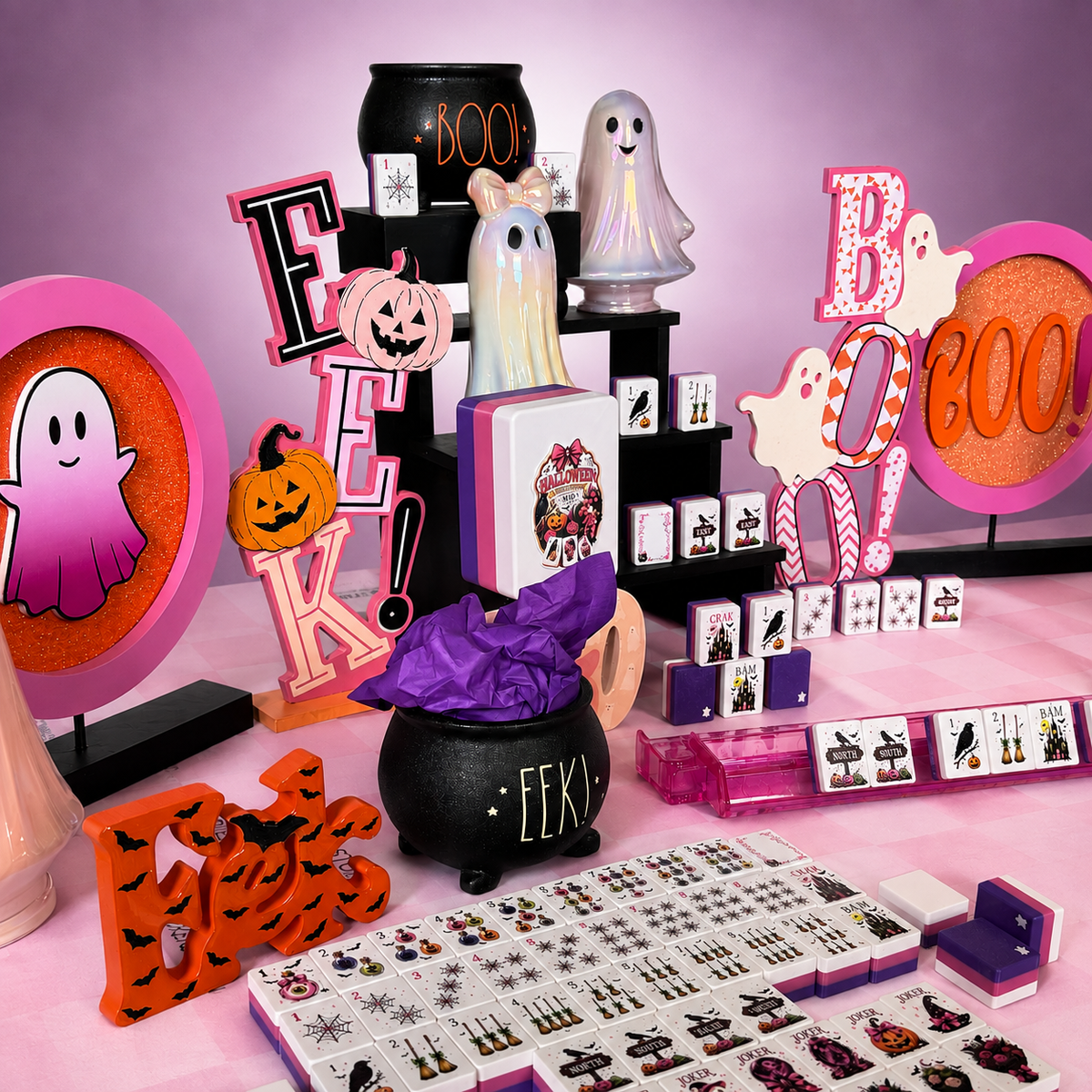 MIO Mahj Halloween American Mahjong set styled for game night with ghosts, a cauldron, and pink and purple decor
