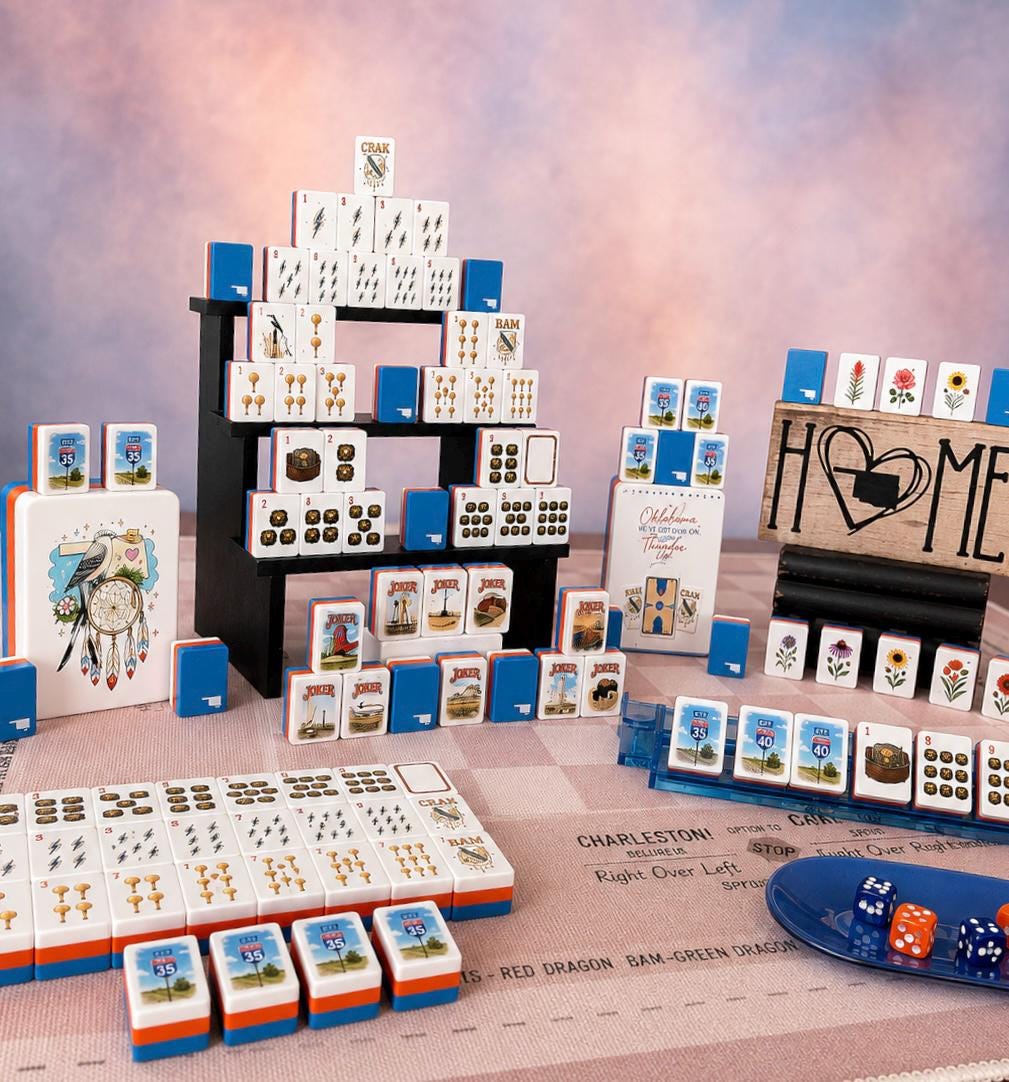 An Oklahoma American Mahjong set arranged with tiles, dice, and a Charleston reference mat by MIO Mahj
