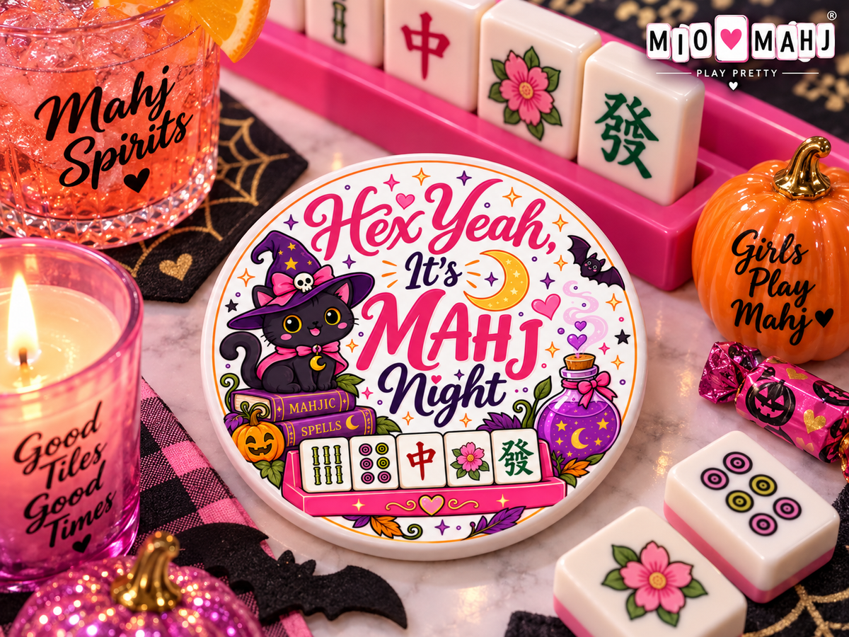 Halloween mahjong coaster with a Hex Yeah It's Mahj Night black cat and witch design, styled on a game night table by MIO Mahj
