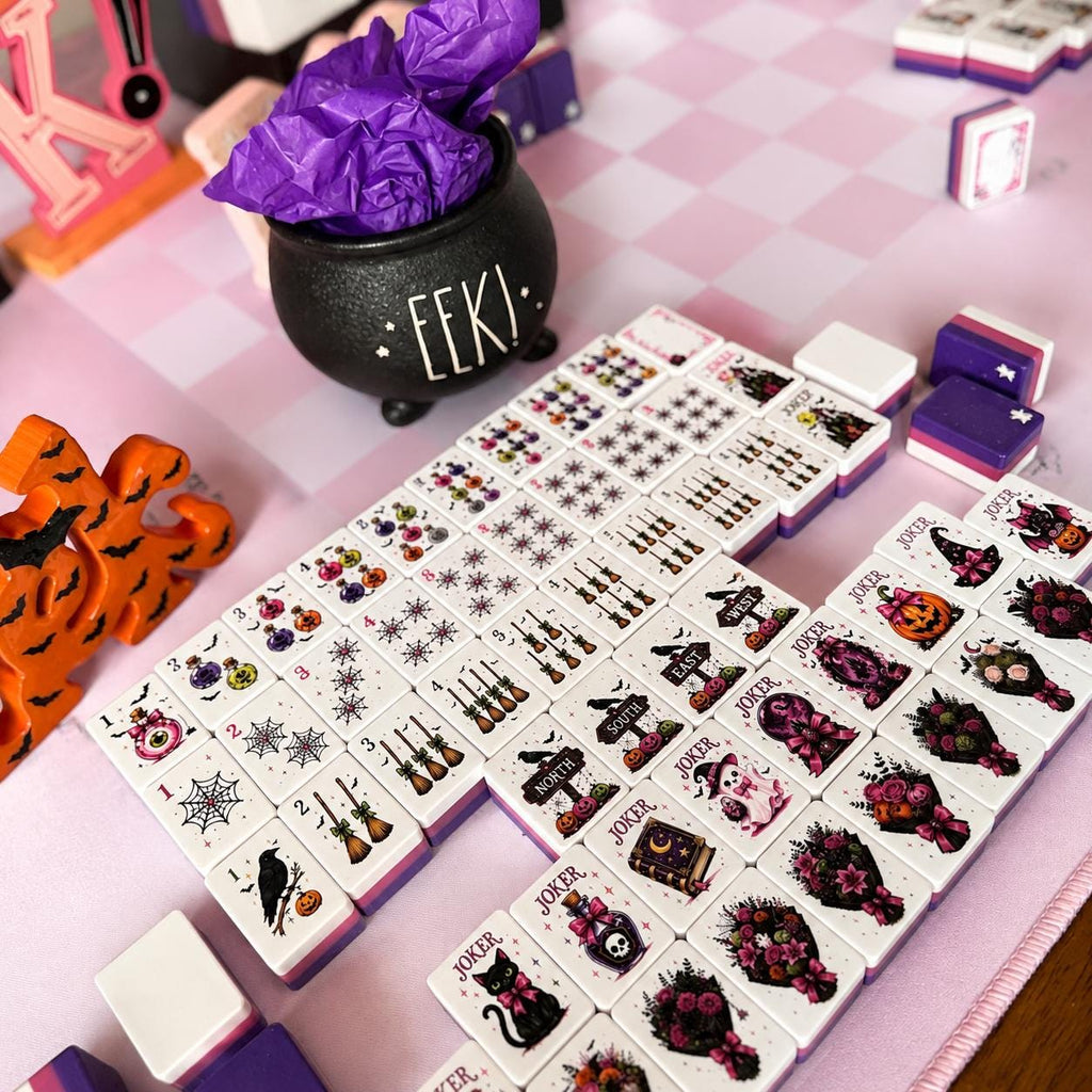 Halloween mahjong tiles with ghosts, witches and pumpkins